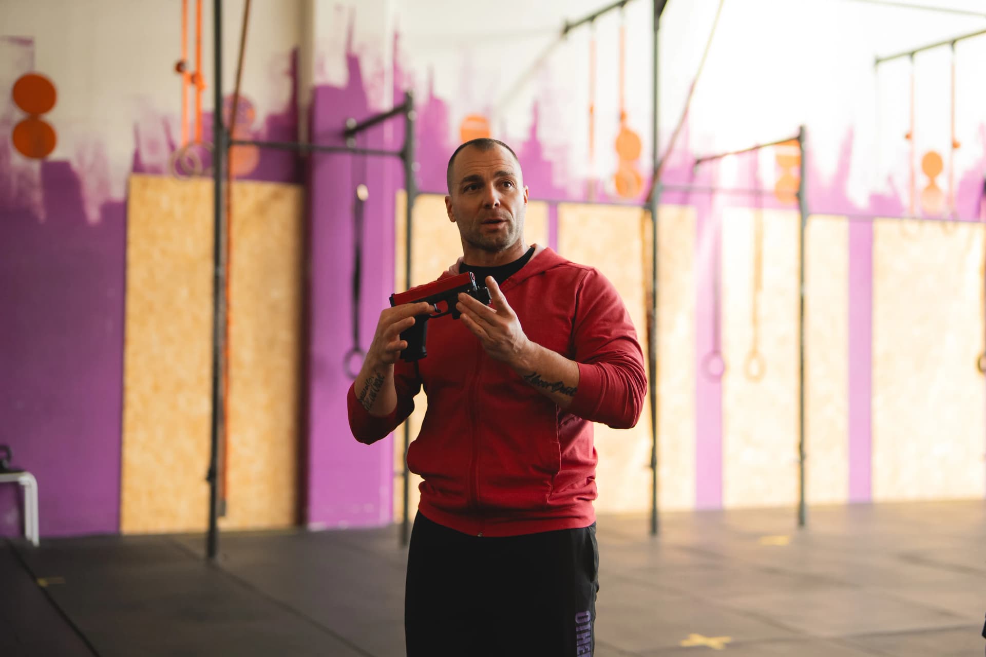 Coach APX con pistola laser